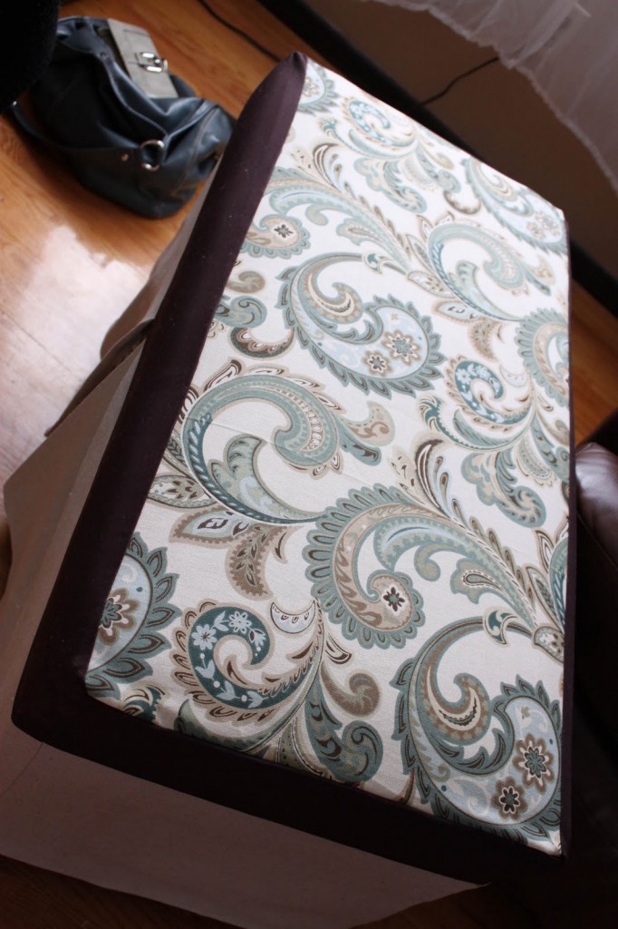 A ottoman with a slip cover